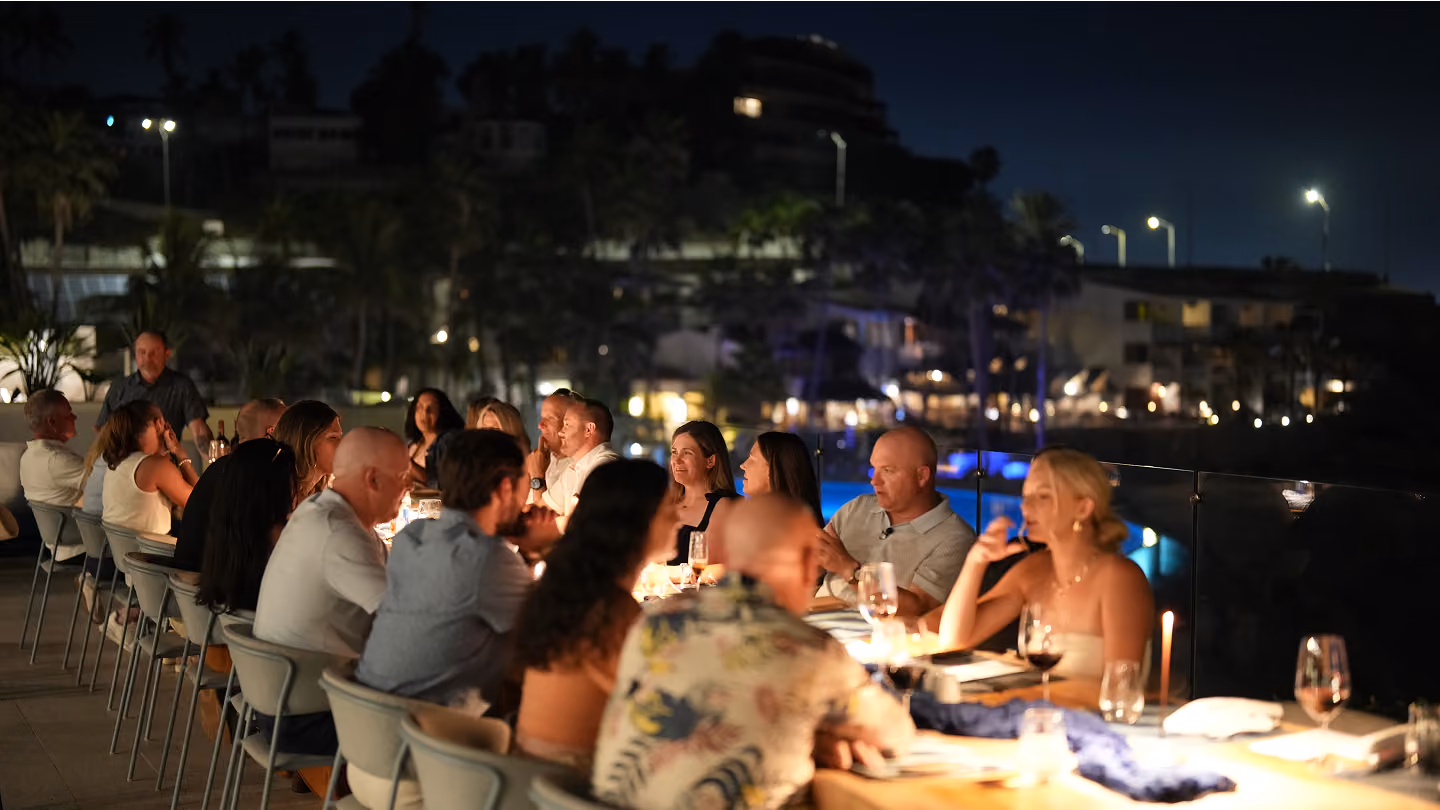 Guests dining together outdoors at an existing EPIC event